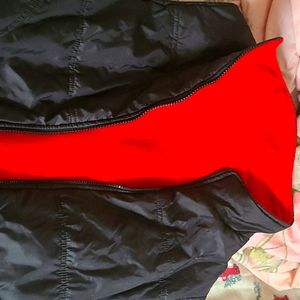 Black and red vest